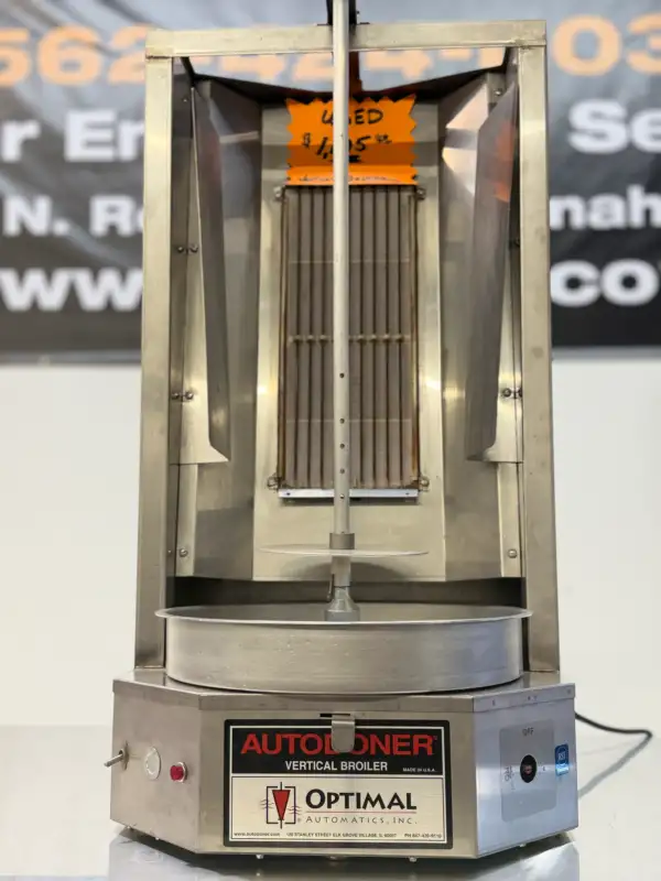 Close-up of Autodoner 3PGM Vertical Broiler Serial Plate Showing 120V/60Hz Electric, 1 Amp Power, Natural Gas Compatibility, and 20,000 BTU/hr Output.